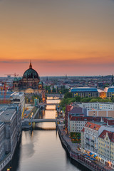 The Spree river in Berlin with the cathedral at sunset - obrazy, fototapety, plakaty