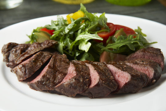 wood grilled layered beef loin with salad