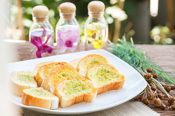 Homemade garlic bread in the garden
