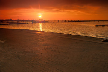 Harbor without ships at sunset