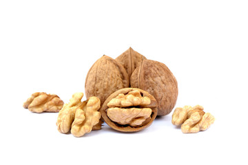 Fresh walnuts with a shell isolated on white background