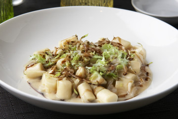 Potato gnochi in Taleggio cheese, endive, balsamic, and honey