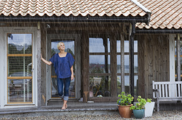 A woman enjoying the rain, Sweden.