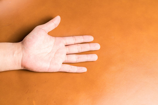 hands on leather background
