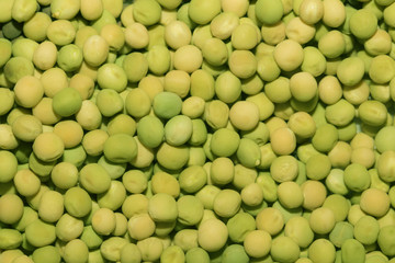 Fresh green Peas as background