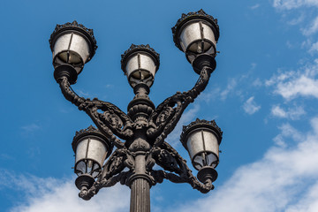 Fototapeta na wymiar Ornate iron lamp post at Arriaga Plaza, Bilbao, spain