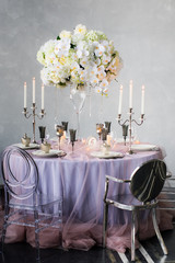 Wedding decoration with orchids and candles