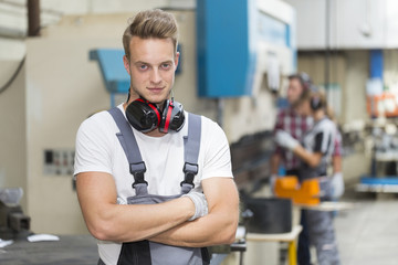 Portrait of young man metallurgist