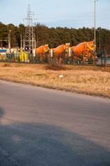 The image of construction company with concrete mixer