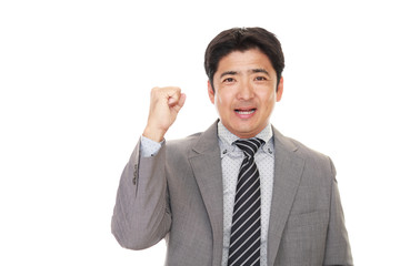 ガッツポーズのビジネスマン