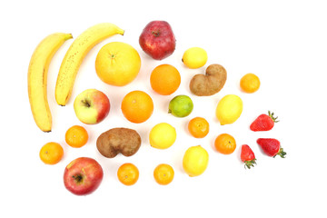 large assortment of fruit on white background
