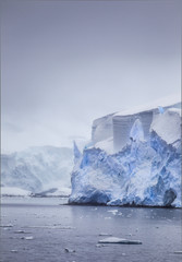 antarctic iceberg mist in the distance