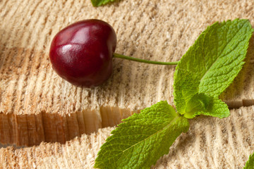 Cherries with water drops on the stump