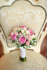 Beautiful wedding colorful bouquet for bride. Beauty of colored flowers. Close-up bunch of florets. Bridal accessories. Female decoration for girl. Details for marriage and for married couple