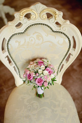 Beautiful wedding colorful bouquet for bride. Beauty of colored flowers. Close-up bunch of florets. Bridal accessories. Female decoration for girl. Details for marriage and for married couple