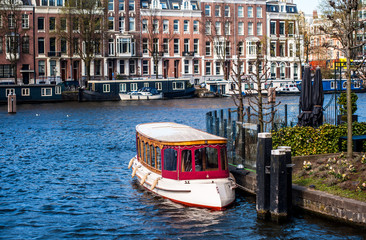 Small boat at Amsterdam canal