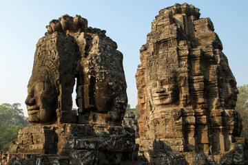 Stone face in Bayon Temple at Angkor Wat complex in Siem Reap Cambodia