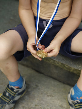 A boy with a gold medal, Sweden.