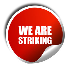 we are striking, 3D rendering, a red shiny sticker