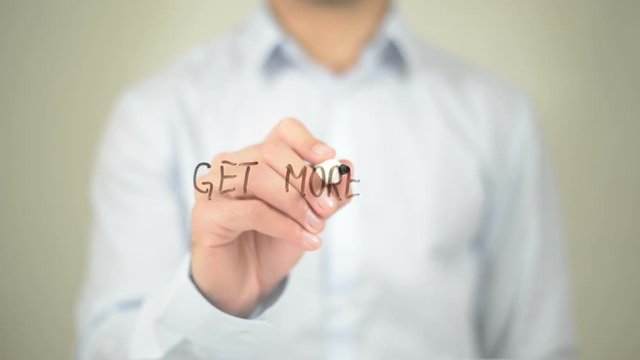 Get More Done , Man writing on transparent screen