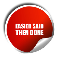 easier said then done, 3D rendering, a red shiny sticker