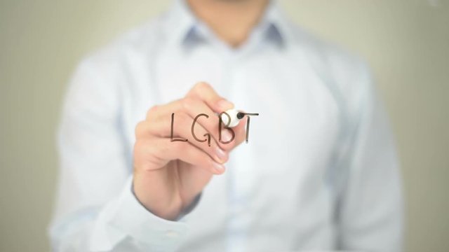 LGBT , Man writing on transparent screen