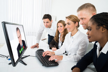 Businesspeople Videoconferencing On Computer