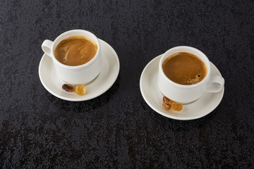 Strong coffee on black background