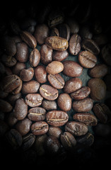 Coffee Beans on  Wood Table Closeup