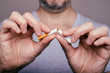 Quit smoking - male hand crushing cigarette