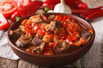 Arabic cuisine: lamb stew with vegetables close up in a bowl. horizontal

