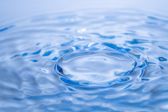 Abstract circle water drop reflection. Blue fresh water liquid t
