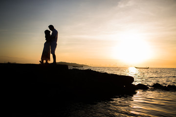 Couple glad to be at the beach. During the summer