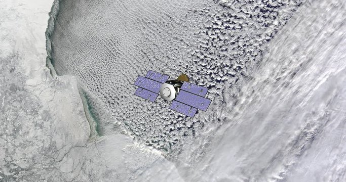 Top view of Earth-observing CloudSat spacecraft in orbit above Northern Canada. Data: NASA/JPL.