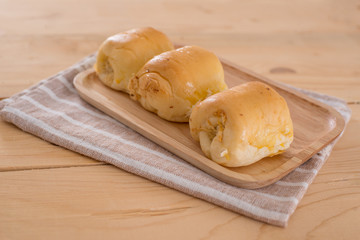 Dried shredded pork bread on wooden tray background
