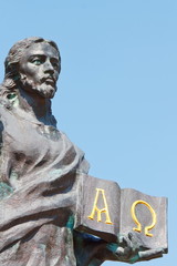 Sculpture of Christ with book of Covenant in hand - detail of th