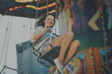 Woman Carnival Ride Riding Happiness Fun Concept