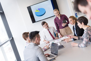 young business people group on meeting at modern office