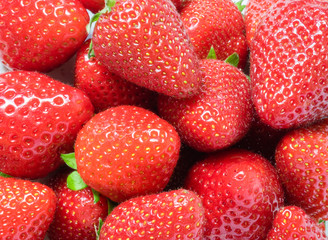 background from freshly harvested strawberries, directly above strawberries