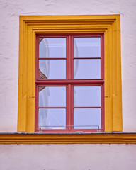 vibrant orange framed window closeup