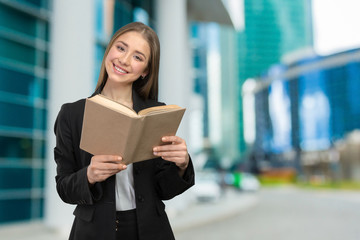 Smiling girl with books