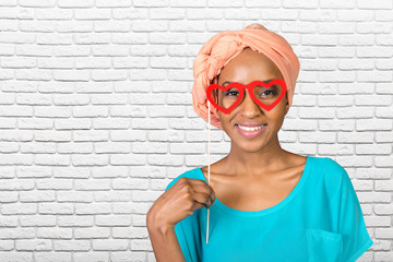African american woman having fun with photo props © fotofabrika