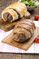 Minced meatloaf wrapped in bacon
