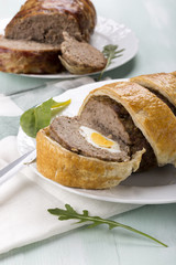Minced meatloaf with boiled eggs