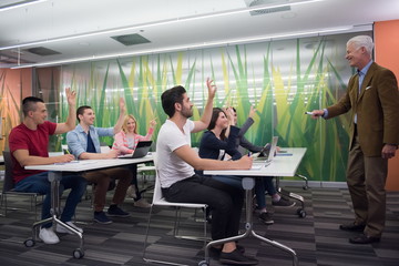 teacher with a group of students in classroom