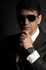 Business man in suit with sunglasses