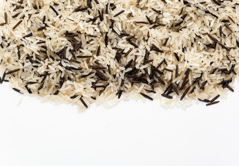 Heap of boiled mixed brown rice isolated on white