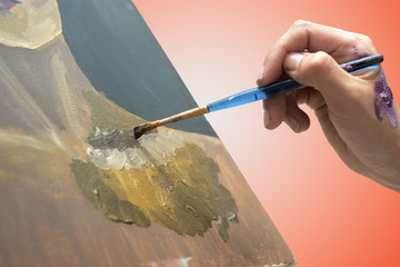 Obraz premium artist paints picture on canvas