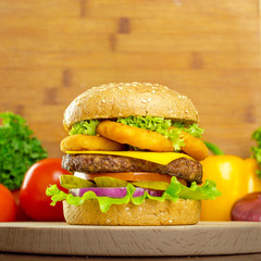 burgers on wooden background