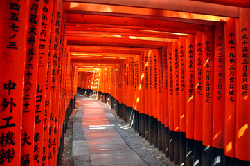 Vermilion red torii gates at Fushimi Inari Taisha, a shrine in K
